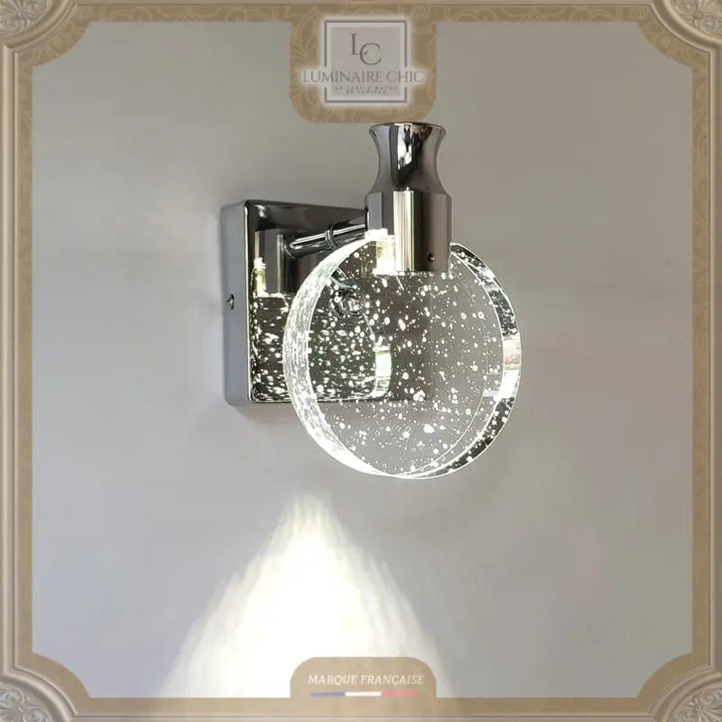 Round wall light in metal and glass ring